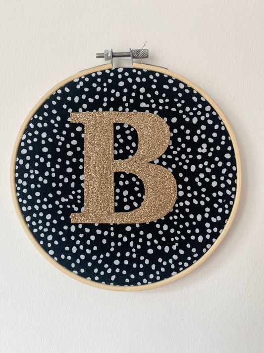 Black Dotty Fabric and Gold Glitter Letter Hoop